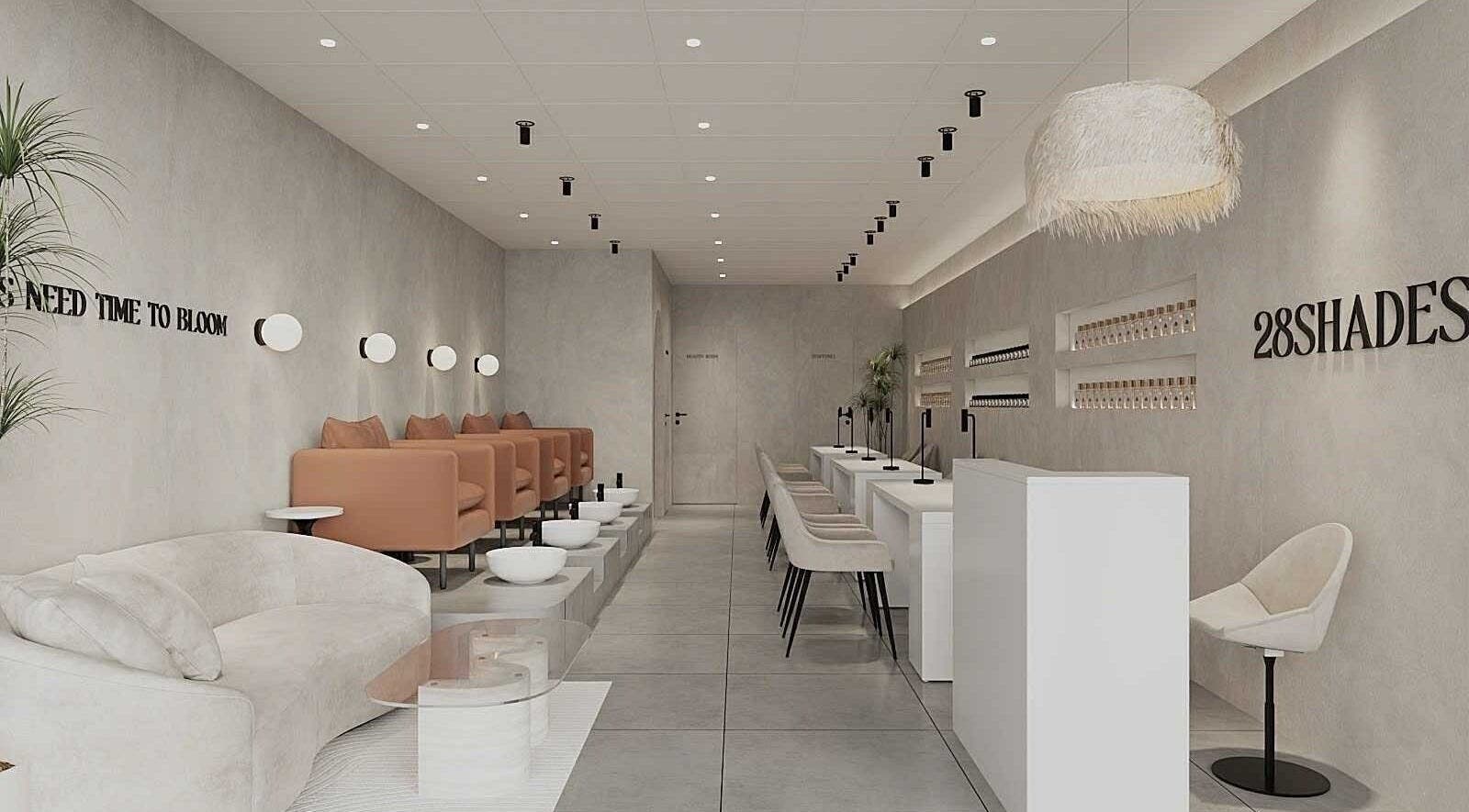 Elegant interior of 28 Shades beauty salon in Brendale, Queensland, AU, with cozy seating and modern decor.