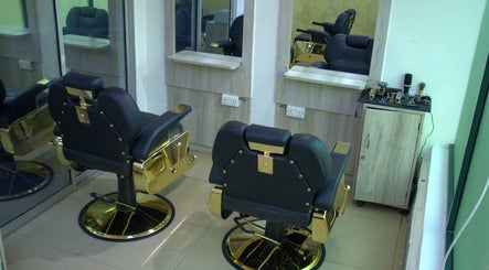 Luxurious chairs at Strands On Fleek Hair & Nail Bar, Nairobi, KE, showcasing elegance and comfort.