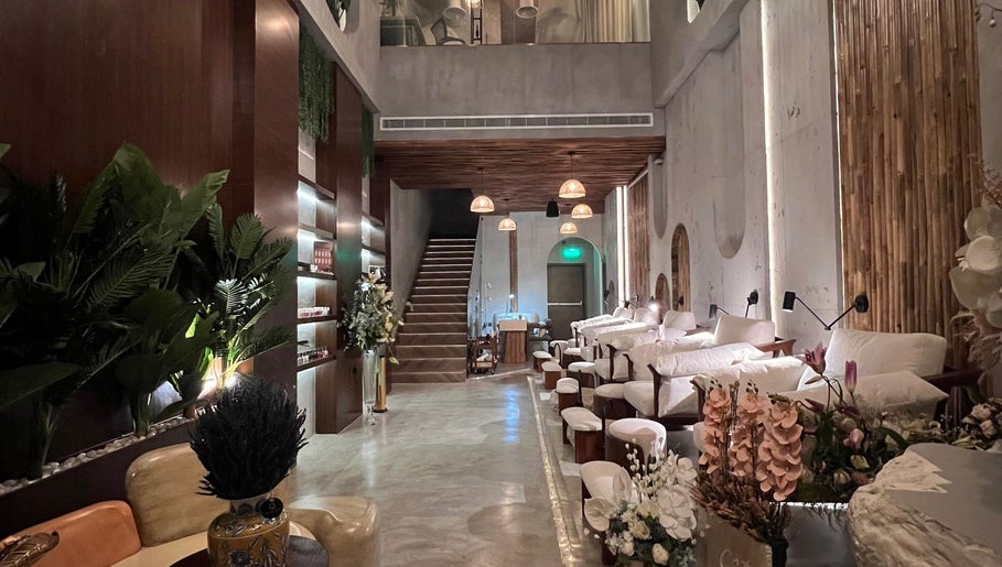 Modern, serene interior of Côte nail spa | كوت سبا in Riyadh, Riyadh Province, SA, featuring plush seats.