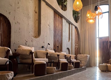 Relaxing interior of Côte nail spa | كوت سبا, Riyadh, Riyadh Province, SA with elegant seating and warm lighting.
