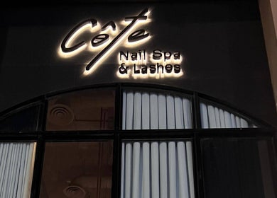 Côte nail spa | كوت سبا entrance sign in Riyadh, Riyadh Province, SA, glowing at night.