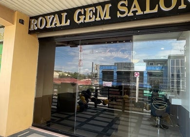 Entrance of RoyalGem Salon and Spa, Tarlac City, Central Luzon, PH, showcasing modern glass doors.