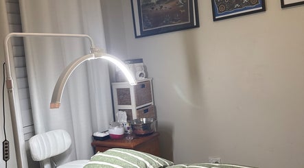 Comfortable treatment room at Elegance by Bronte, Uralla, New South Wales, AU with relaxing decor.