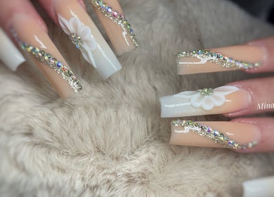 Stylish nail art with rhinestones at Minatanti, Perpignan, Occitanie, FR.