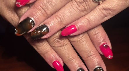 Hand with Only Press hand painted press on nails in Cape Town, Western Cape, ZA showcasing intricate designs.