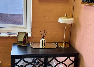 Chic vanity setup at NailedItByLarna, Redditch, England, GB with modern decor and soft lighting.