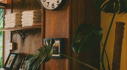 Cozy corner with shelves and plant decor at Kin Studio, Margate, England, GB highlighting wellness charm.