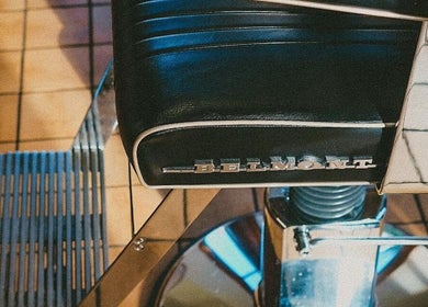 Classic barber chair at Kin Studio, Margate, England, GB offering luxurious beauty and wellness experiences.
