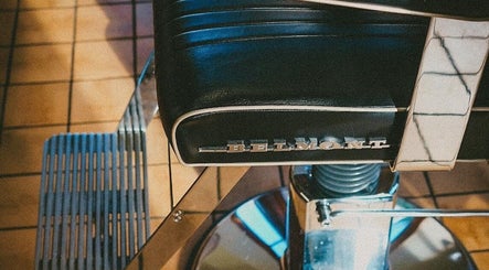 Classic barber chair at Kin Studio, Margate, England, GB offering luxurious beauty and wellness experiences.