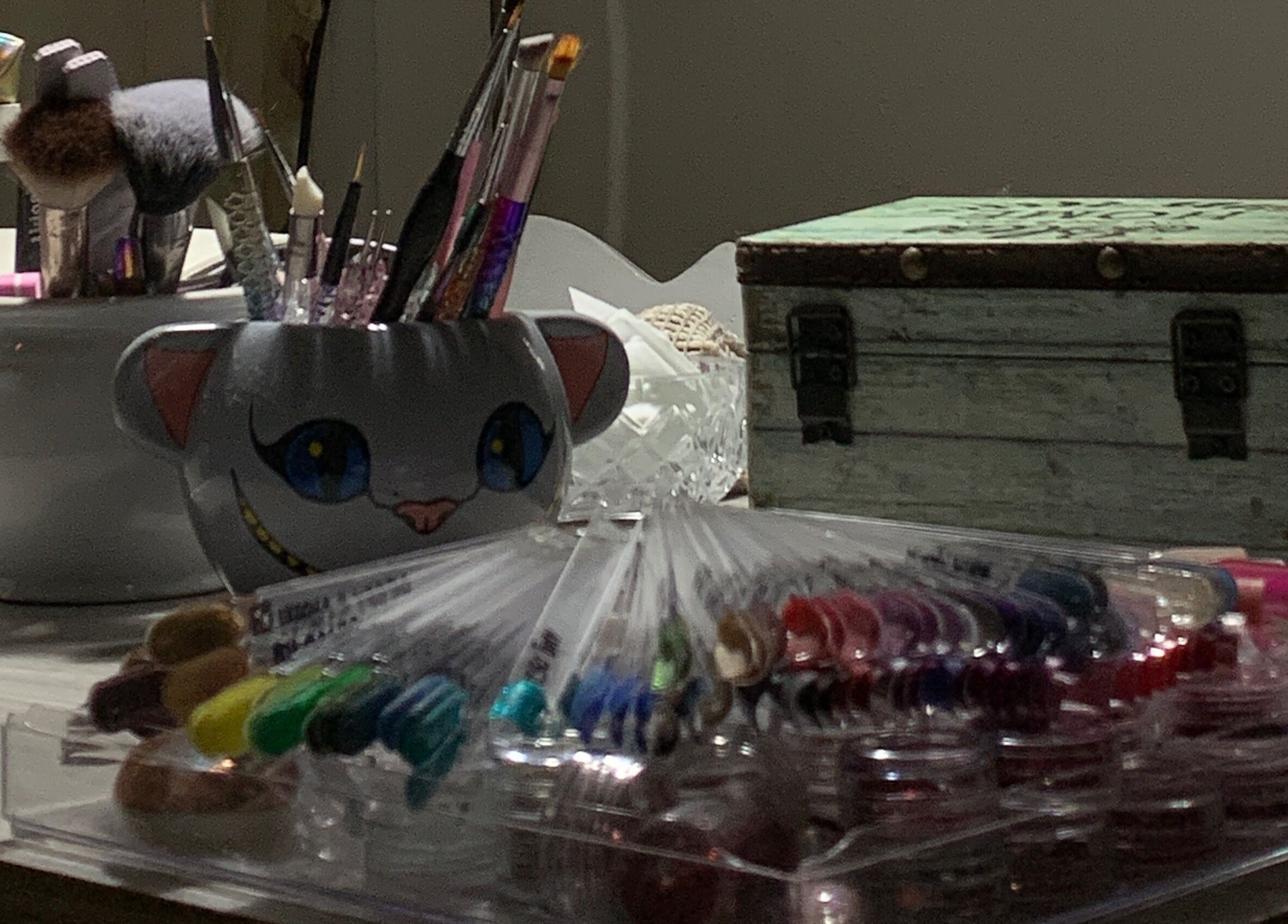 Nail art tools and brushes at Sky Nails, Pablo Podesta, Provincia De Buenos Aires, AR, showcasing vibrant creativity.