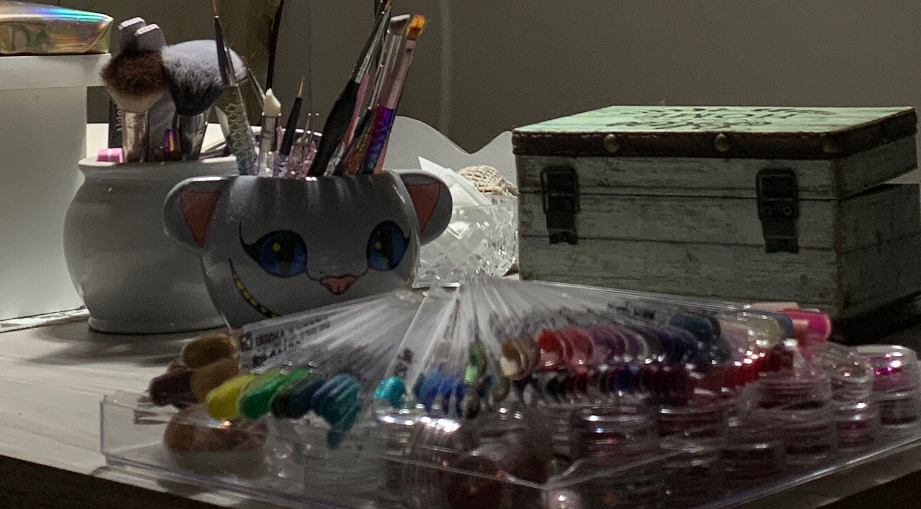 Nail art tools and brushes at Sky Nails, Pablo Podesta, Provincia De Buenos Aires, AR, showcasing vibrant creativity.