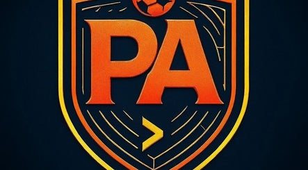 Stylized emblem of PeachPoint Academy, Suwanee, Georgia, US with orange initials on dark background.