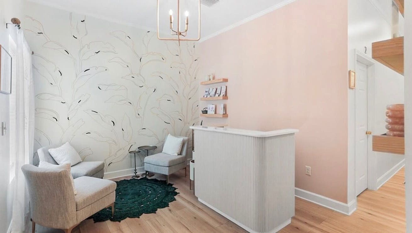 LOR Beauty Concept's chic reception area with elegant seating, Jacksonville, Florida, US.