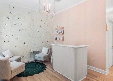 LOR Beauty Concept's chic reception area with elegant seating, Jacksonville, Florida, US.