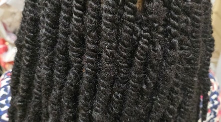 Close-up of beautifully twisted braids at Arty, Rochdale, England, GB showcasing intricate hair styling.