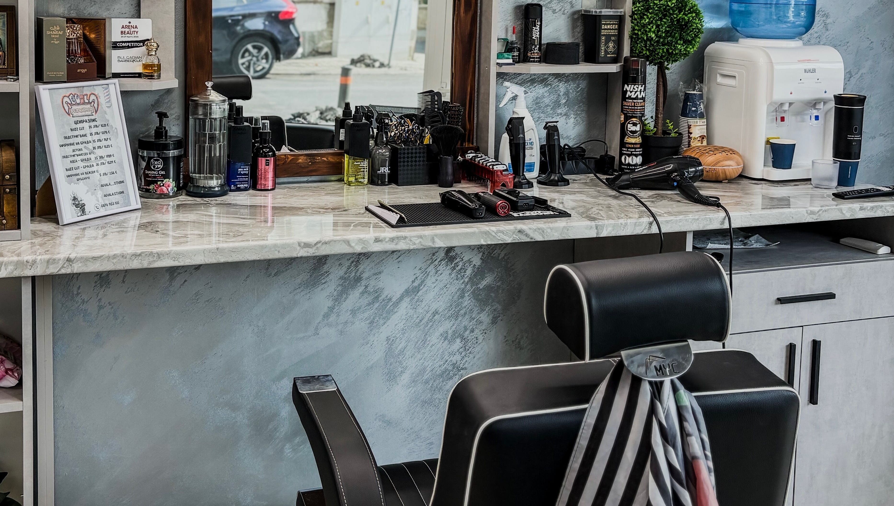 Stylish barber chair and grooming tools at Aguila Studio, Stara Zagora, Stara Zagora, BG.