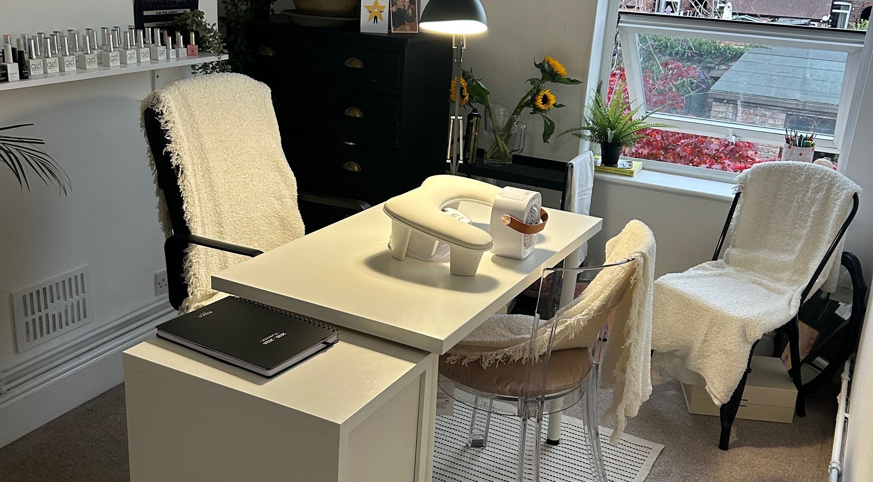 Bright nail station at Jml Nail Lab, Derby, England, GB with sunlight and modern decor.