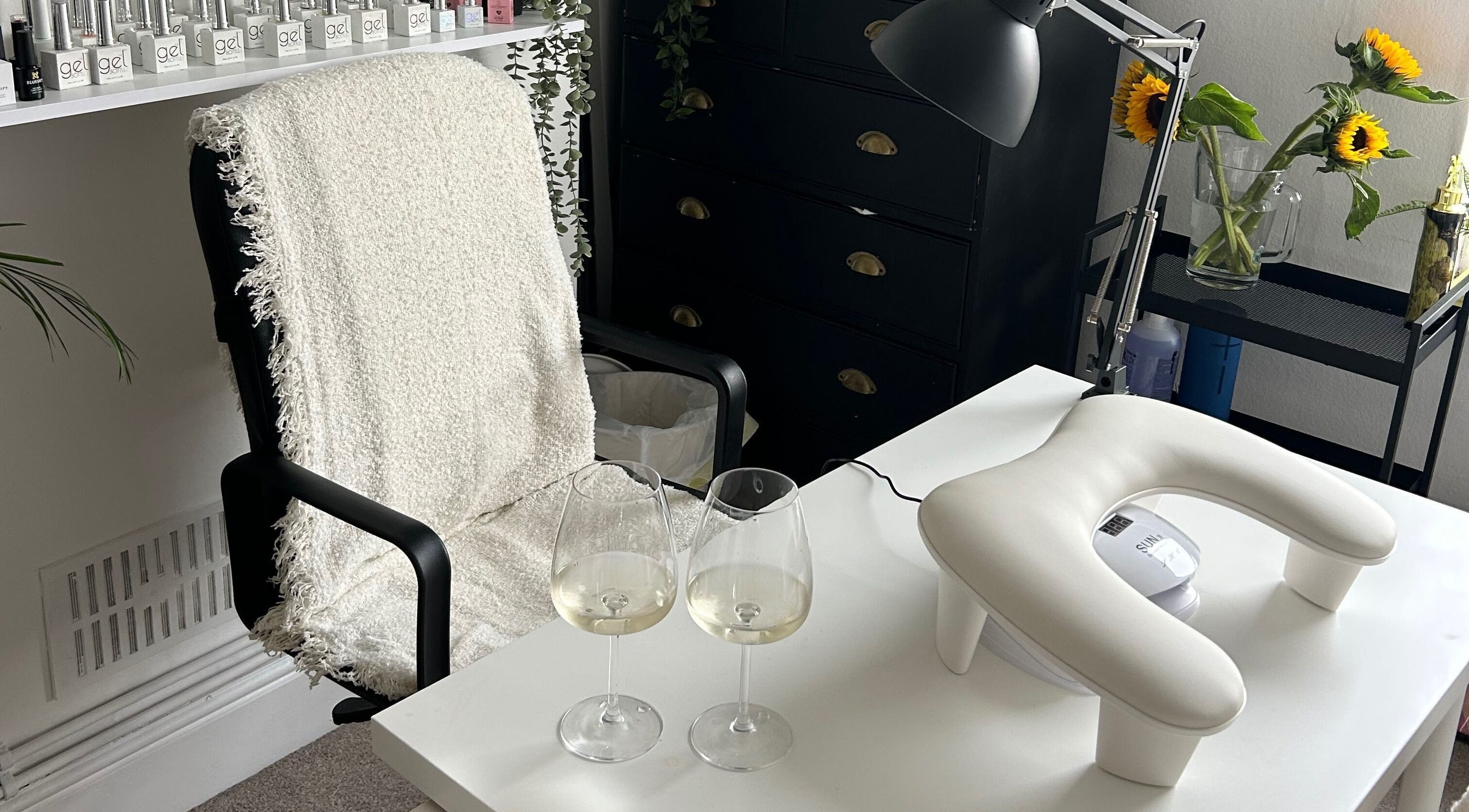 Comfortable nail care setup at Jml Nail Lab, Derby, England, GB, with tools and sunflowers.