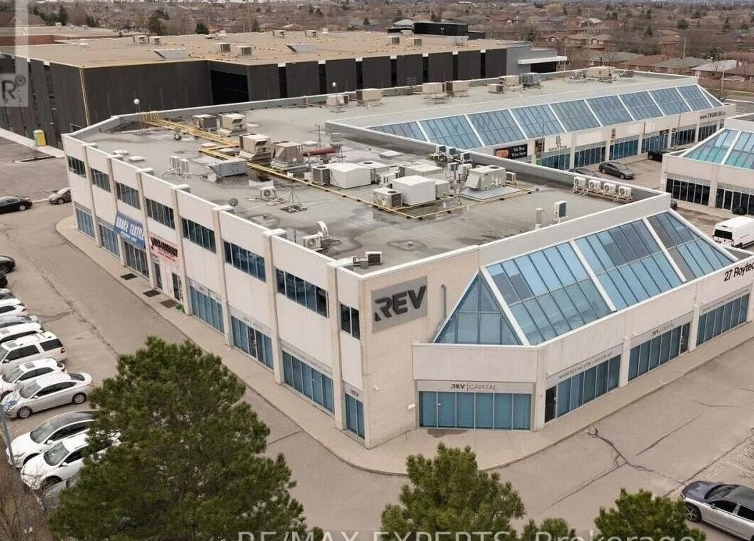 Aerial view of Glow Essence Beauty at Vaughan, Ontario, CA, showcasing attractive commercial complex.