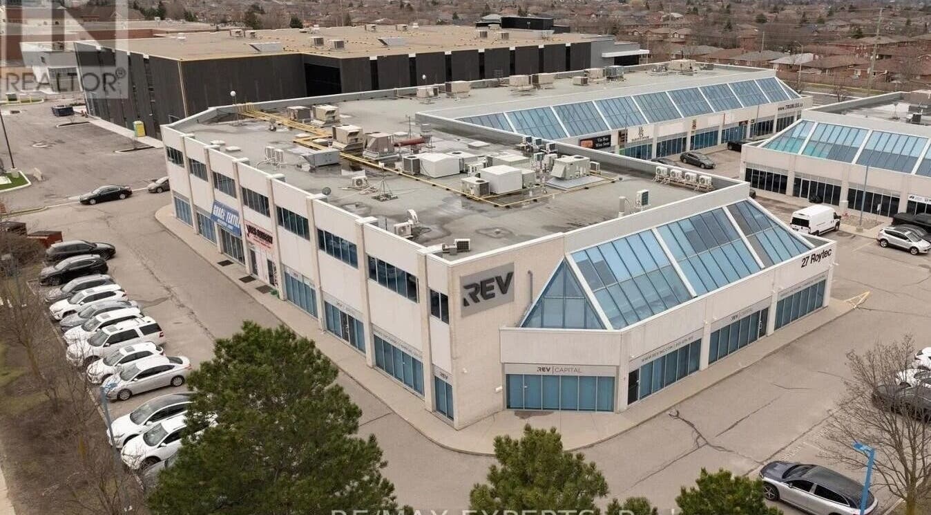 Aerial view of Glow Essence Beauty at Vaughan, Ontario, CA, showcasing attractive commercial complex.