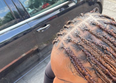 Intricate braid style showcased at Naomiscrownedtouch, London, England, GB.
