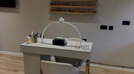 Luxurious nail station at Queen B Beauty in Newhaven, England, GB, featuring modern decor and tools.