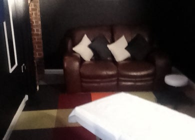 Comfortable seating area at Rudders & Rubdowns Male Massage Spa, Lowestoft, England, GB.