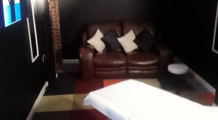 Comfortable seating area at Rudders & Rubdowns Male Massage Spa, Lowestoft, England, GB.