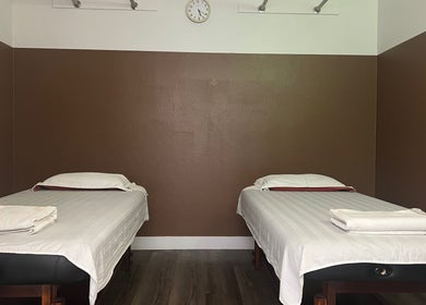 Tranquil massage room at Healthy Life Spa & massage, Las Vegas, Nevada, US with two massage tables and soft lighting.