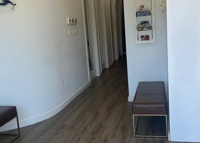 Entrance of Bristol Haircare at In the Grove Hair Studio in Delray Beach, Florida, US with sleek interior.