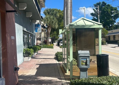 Sidewalk view near Bristol Haircare at In the Grove Hair Studio, Delray Beach, Florida, US.