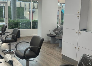 Elegant styling chairs at Bristol Haircare in In the Grove Hair Studio, Delray Beach, Florida, US.