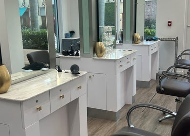 Modern salon chairs and mirrors at Bristol Haircare, In the Grove Hair Studio, Delray Beach, Florida, US.