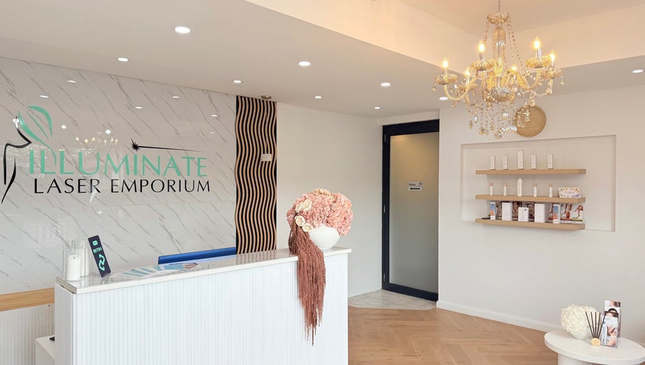 Elegant reception at illuminate Laser Emporium in Melbourne, Victoria, AU with stylish decor and chandelier.