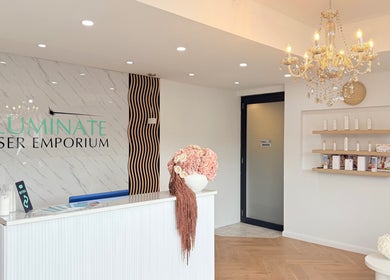 Elegant reception at illuminate Laser Emporium in Melbourne, Victoria, AU with stylish decor and chandelier.