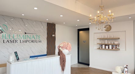 Elegant reception area of illuminate Laser Emporium in Melbourne, Victoria, AU featuring chic decor and lighting.