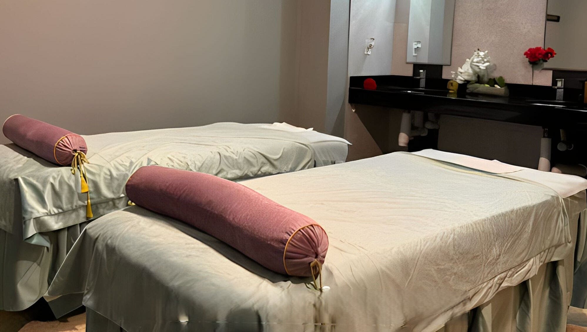 Spa massage room at Healing Lotus Head Spa in Virginia Beach, Virginia, US with serene twin beds.