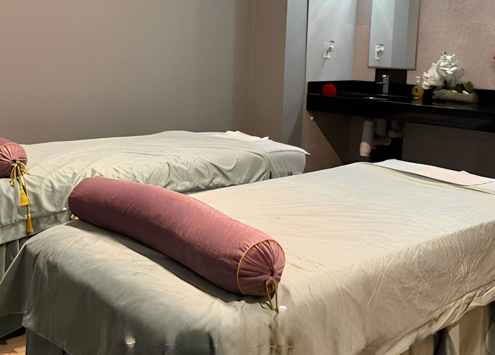 Spa massage room at Healing Lotus Head Spa in Virginia Beach, Virginia, US with serene twin beds.