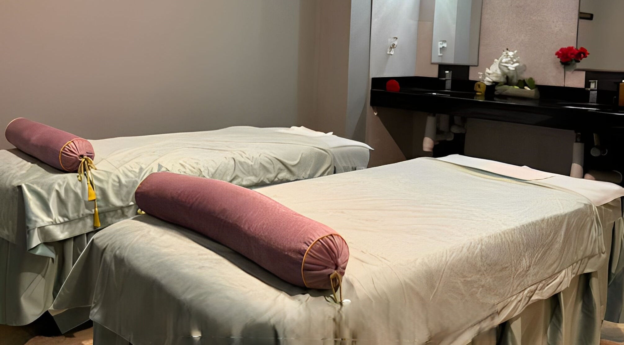 Spa massage room at Healing Lotus Head Spa in Virginia Beach, Virginia, US with serene twin beds.