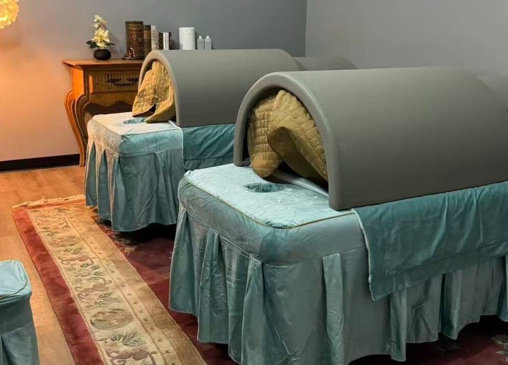 Tranquil massage area at Healing Lotus Head Spa Massage in Virginia Beach, Virginia, US with cozy treatment beds.