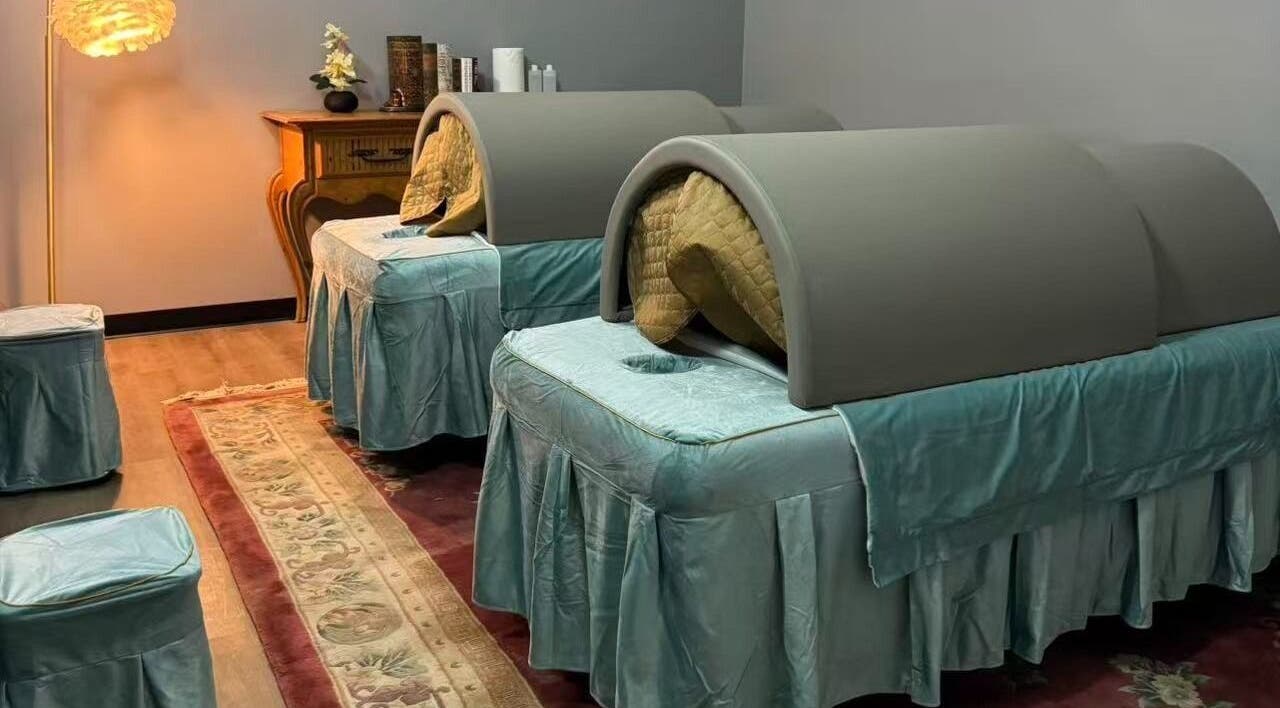Tranquil massage area at Healing Lotus Head Spa Massage in Virginia Beach, Virginia, US with cozy treatment beds.