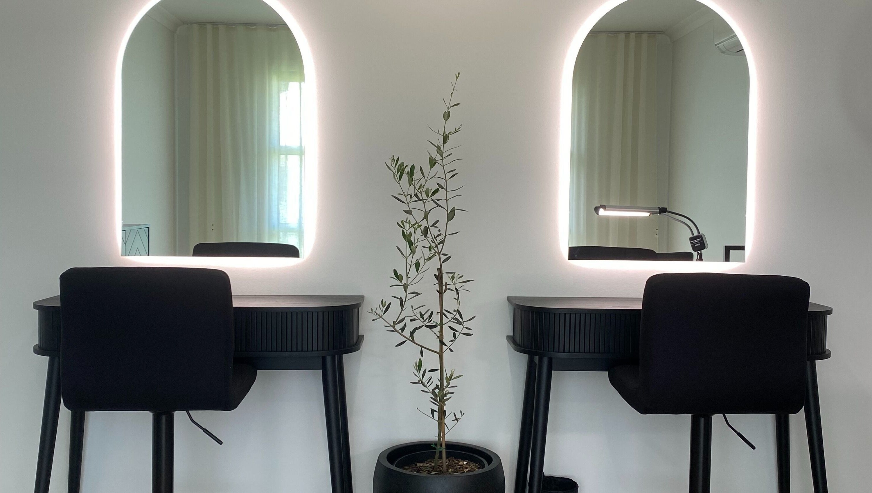 Makeup stations with mirrors at Jilli Maree Makeup and Brows, Taranganba, Queensland, AU.