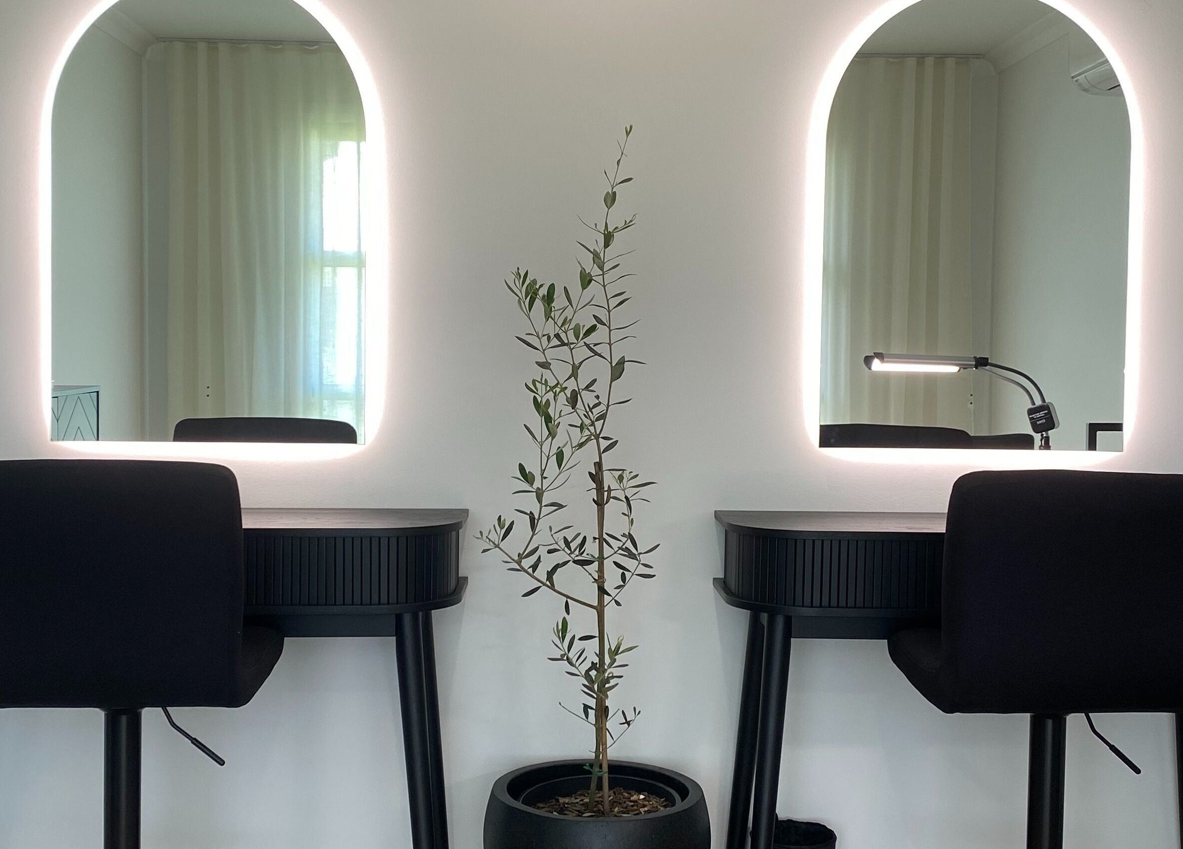 Makeup stations with mirrors at Jilli Maree Makeup and Brows, Taranganba, Queensland, AU.