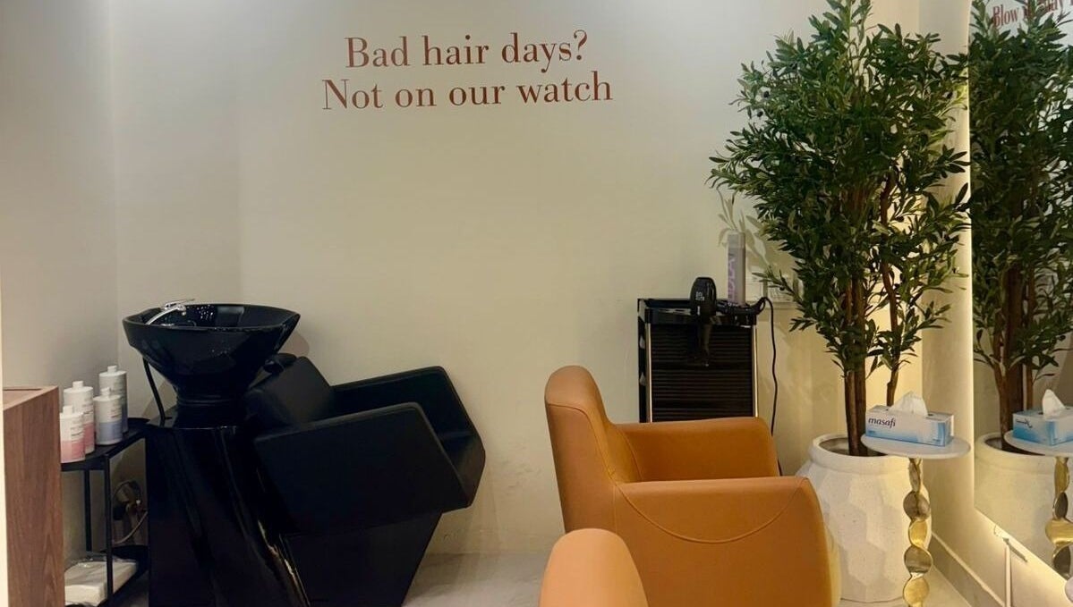 Modern salon interior at Blowbar Ladies Saloon, Dubai, Dubai, AE, showcasing stylish wash stations and decor.