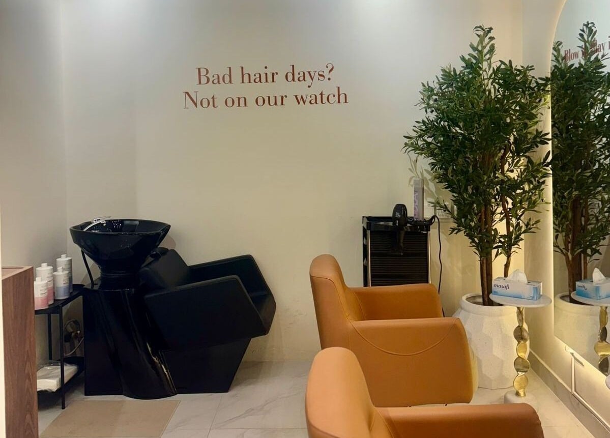 Modern salon interior at Blowbar Ladies Saloon, Dubai, Dubai, AE, showcasing stylish wash stations and decor.