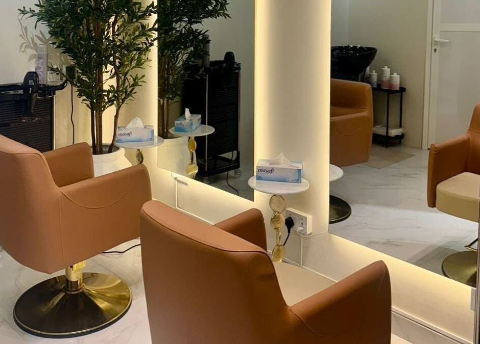 Elegant styling chairs at Blowbar Ladies Saloon in Dubai, Dubai, AE, showcasing a chic and modern interior.