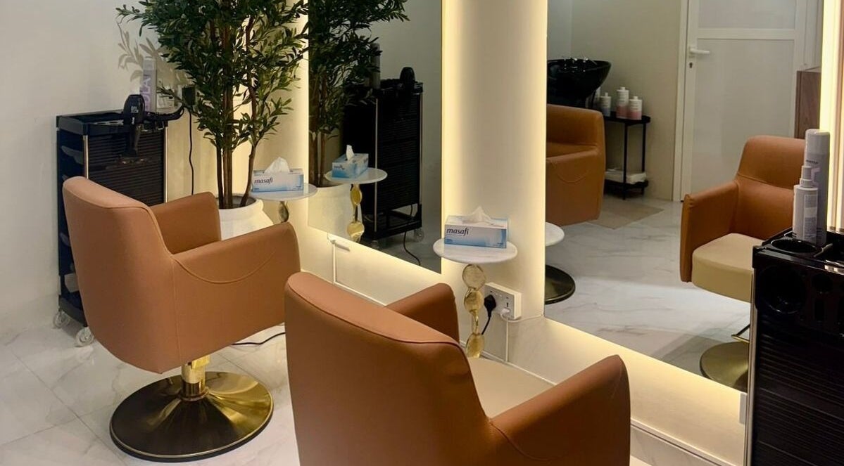 Elegant styling chairs at Blowbar Ladies Saloon in Dubai, Dubai, AE, showcasing a chic and modern interior.