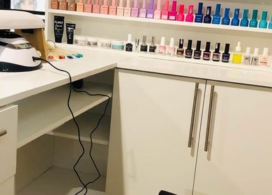 NailedbyStheM nail polish and manicure tools neatly arranged in Soweto, Gauteng, ZA salon.