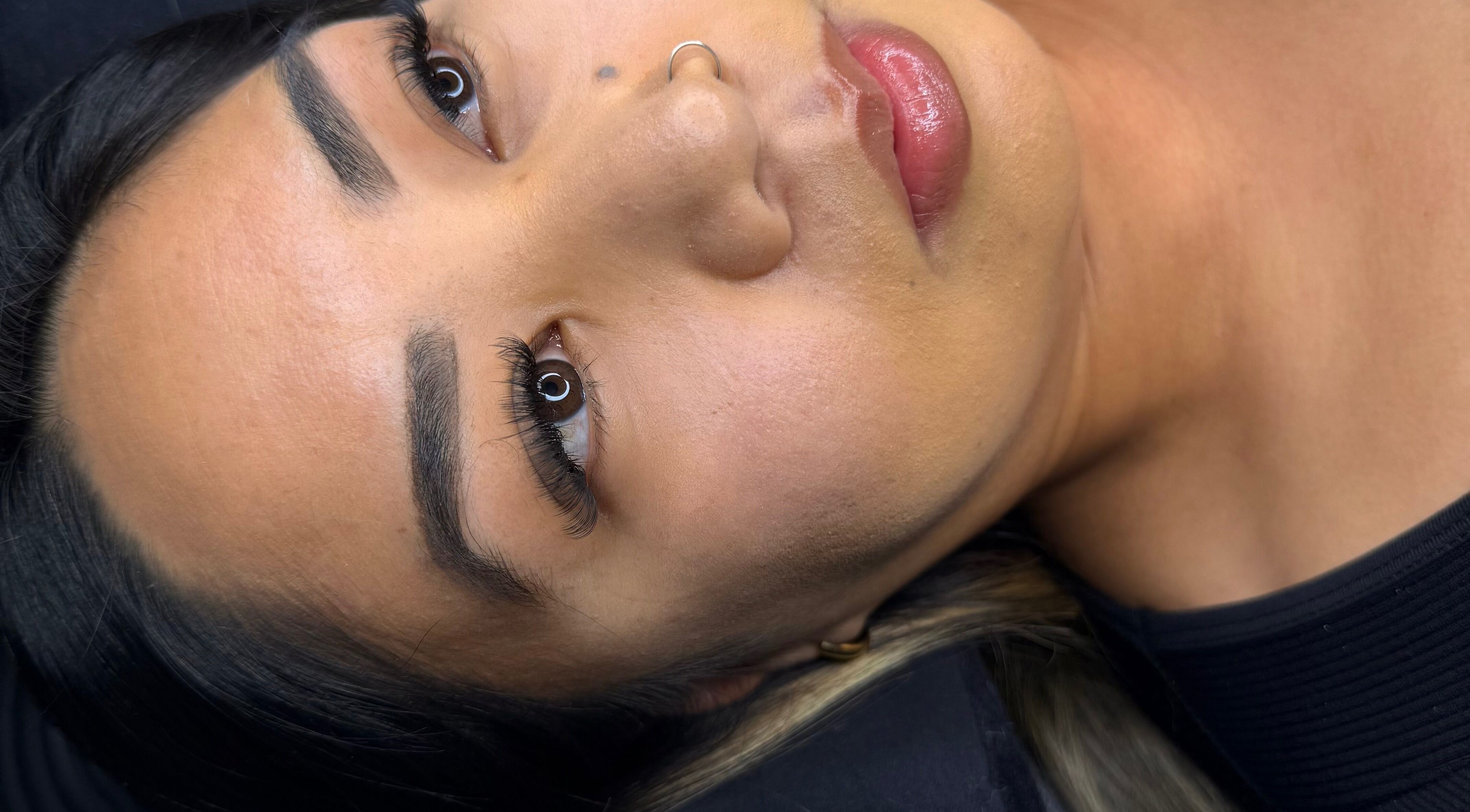 Close-up of a client with flawless makeup at The Scorpio Effect, Auckland, Auckland, NZ.