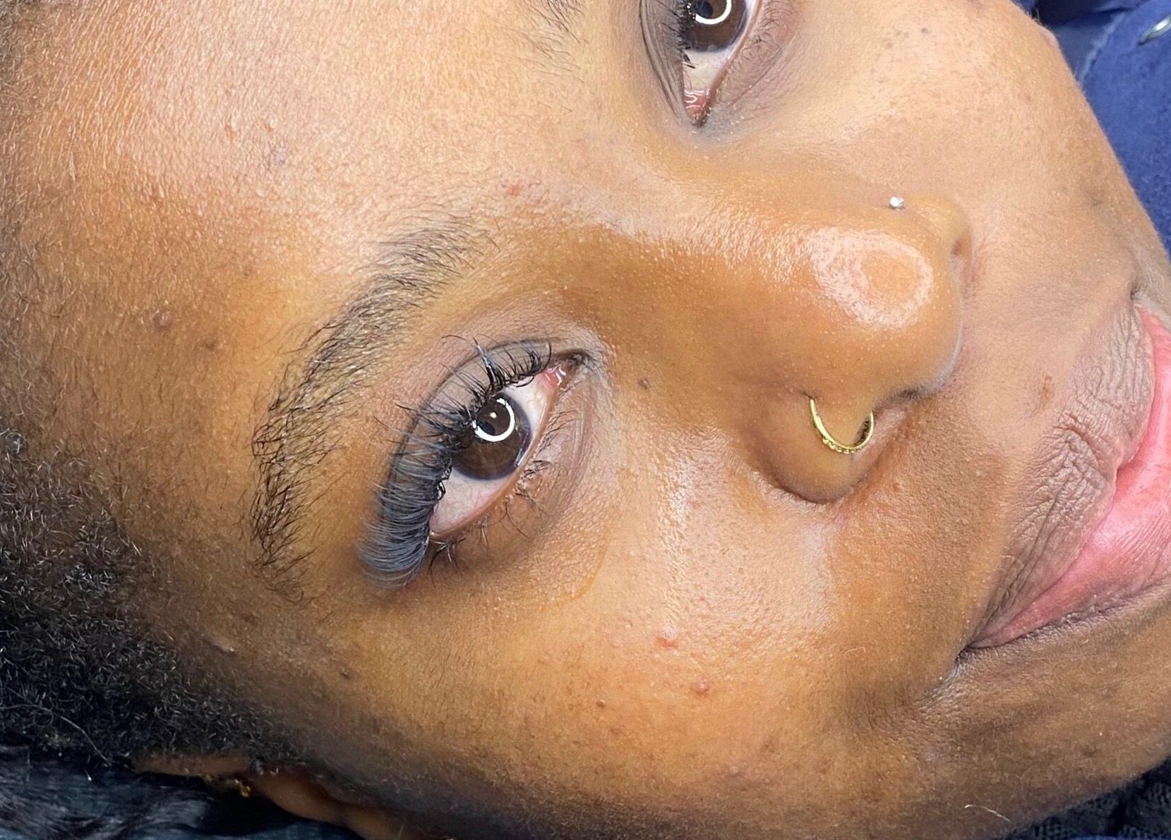 Close-up of a woman with elegant eyelashes at The Scorpio Effect, Auckland, Auckland, NZ.